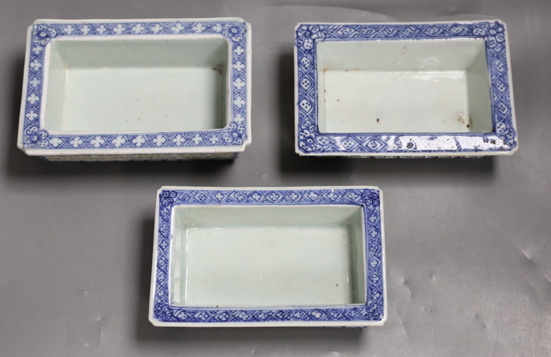 Set of three Chinese blue and white lily or narcissus dishes, Qing dynasty. Widest 18cm